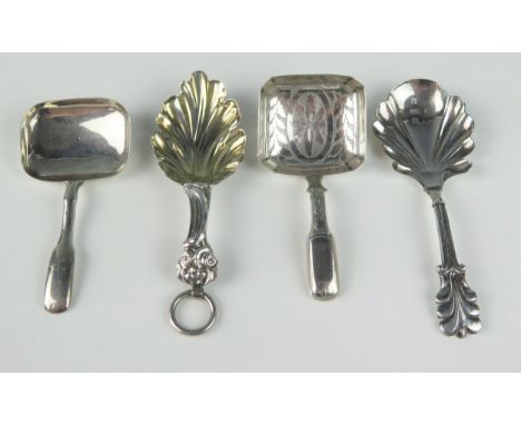 Four assorted silver caddy spoons, various makers and dates, two with shell-shaped bowls, total weight of silver 39gms, 1.26o