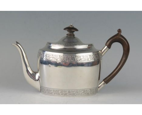 A Victorian silver bachelors teapot, maker Henry Holland, London, 1879, of oval outline, with shallow domed hinged lid, with 