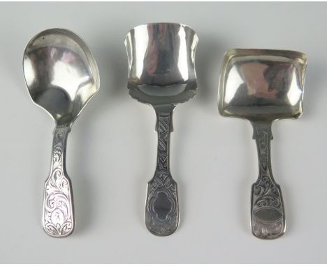 Three assorted silver caddy spoons , maker George Unite, Birmingham, 1846, 1853 and 1870, one initialled, total weight of sil