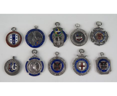 Ten assorted silver and enamel sporting and other medallions/fobs, various makers and dates, includes football, cricket,and o