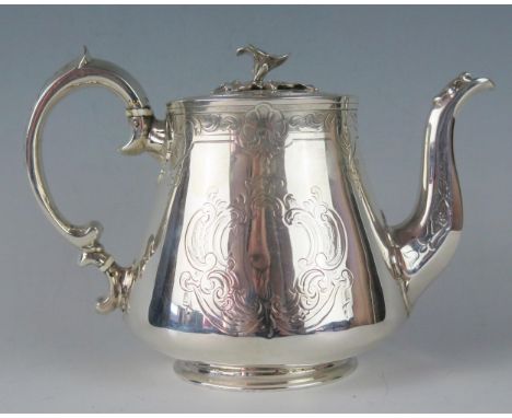 A Victorian silver teapot, maker George Angell &amp; Co, London, 1850, of ovoid form, the hinged lid with floral finial, the 