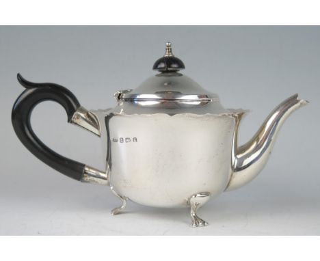 An Edward VII silver circular bachelors teapot, maker A &amp; J Zimmerman Ltd, Sheffield, 1906, with wavy edge border, domed 