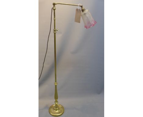  A vintage 20th century metamorphic adjustable floor  lamp, adjustable upper arm with fitted ball joint for direction  surmou