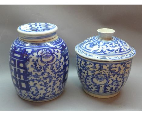 Two Chinese blue and white ginger jars and covers one having wax seal to base