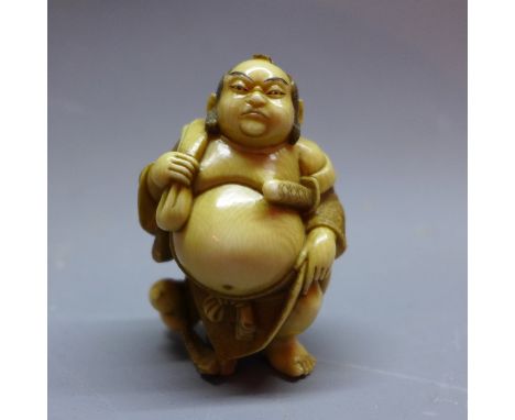 A 19th century Japanese ivory netsuke, signed. H.5cm 