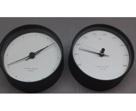 A Georg Jensen clock together with a Georg Jensen barometer