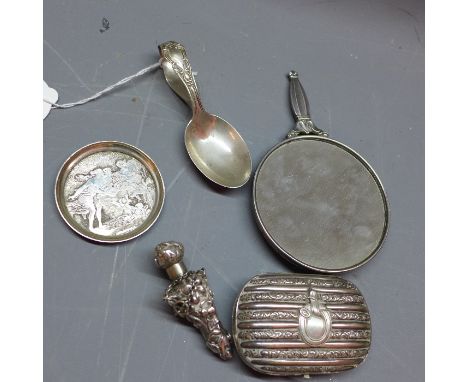 A selection of silver items to include a caddy spoon, perfume bottle, hand mirror small dish and small purse. 