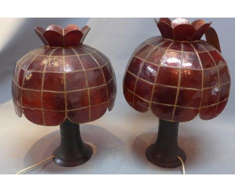 A pair of Chinese bronze vases later converted to lamps with red glass shades.