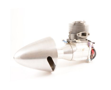 Petrol engine, single cylinder with large spinner.
