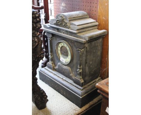 Large 19th Century black slate and marble mounted mantel clock having circular dial with Roman numerals and two train movemen