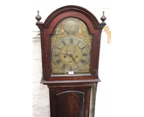 Early 19th Century mahogany longcase clock, the broken arch hood above a plain panelled door and conforming plinth base, the 