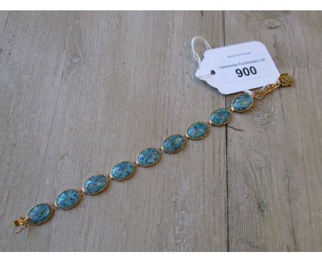14ct Yellow gold opal inset braceletOverall length is 19.5cmsAll panels are secure and undamaged 