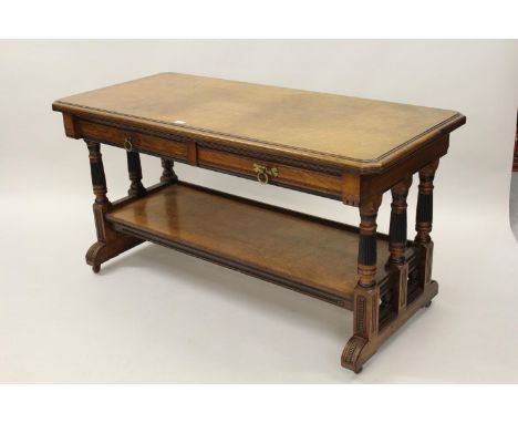 Lamb of Manchester, good quality pollard oak library table, the moulded top above two frieze drawers with brass ring handles,