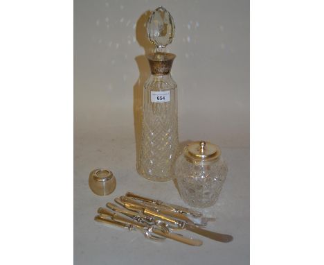 Silver mounted cut glass decanter with stopper,  silver mounted cut glass preserve jar and cover, silver mounted glass match 