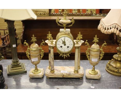 French ormolu and marble three piece clock garniture, the enamel dial with Arabic numerals inscribed ' Bouche Sin-Noble ', wi