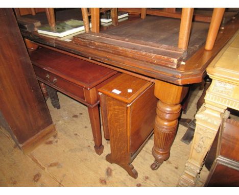 Late Victorian mahogany wind-out extending dining table, the moulded top above turned and fluted supports with brass and cera