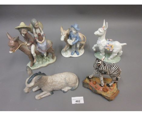 Two Lladro figures of donkeys, similar Nao figure and two others 