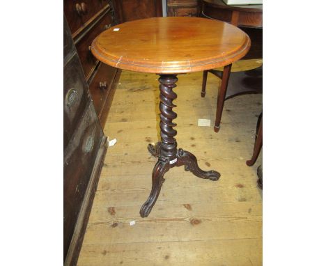 Victorian mahogany circular pedestal table with a barley twist column support and tripod base, together with a similar smalle