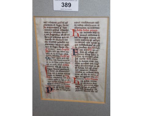 Framed Medieval leaf of text from a manuscript inscribed verso ' Leaf from a Breviary - Cologne, 14th Century ' 