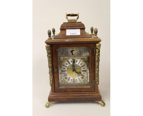 Small reproduction walnut cased two train mantel clock with moonphase dial, together with a French black slate and marble sin