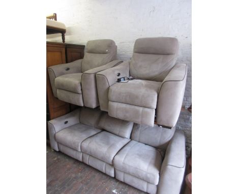 Modern suede upholstered three seat electric recliner sofa, together with a pair of matching armchairs 