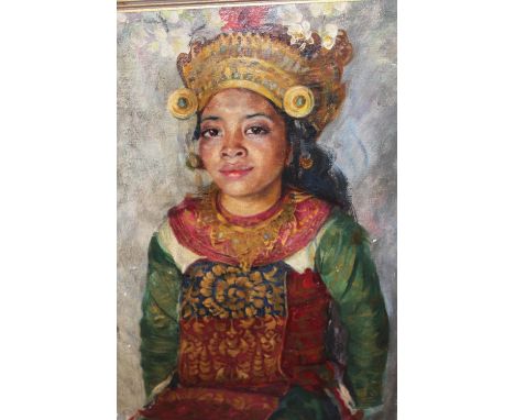 Anatole Shister, oil on canvas, portrait of a Balinese girl wearing traditional costume, signed and dated 1938, 34ins x 23ins