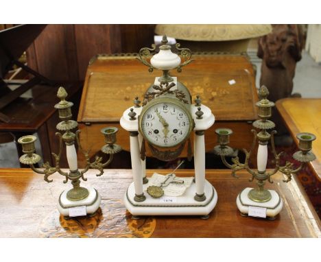 19th Century French Louis XVI style marble and ormolu mounted clock garniture with two train movement striking on a bell 