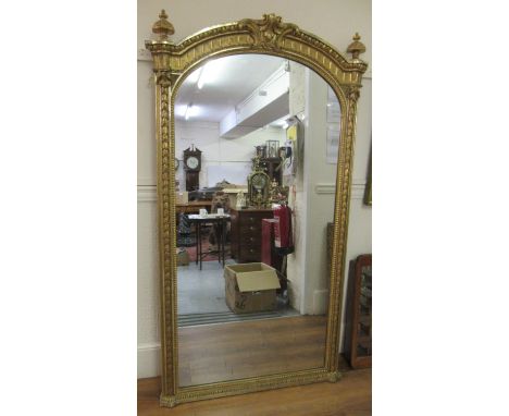 Large good quality 19th Century French gilded composition wall mirror, the arched top with finials and acanthus surmount, the