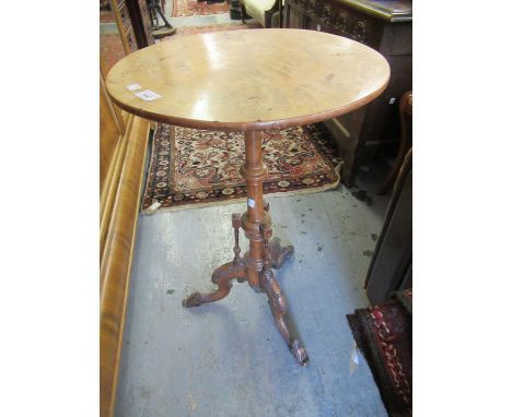 Victorian figured walnut and inlaid circular pedestal table on a carved tripod base 