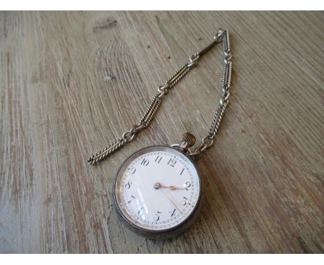 Small silver cased Victorian fob watch with white enamel dial having Arabic numerals and alternating link chain (at fault) 