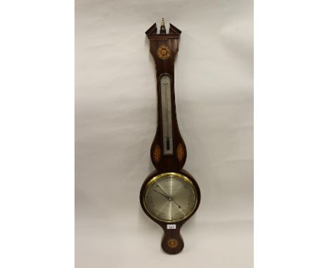 George III mahogany shell and line inlaid wheel barometer, the silvered dial inscribed Cetti and Company London together with
