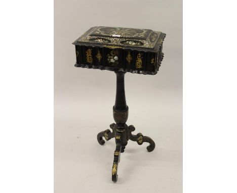 Victorian black lacquered papier mache, mother of pearl inlaid and gilt decorated work box, the hinged cover enclosing a fitt
