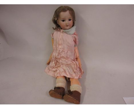 Armand Marseille bisque headed doll marked 390 A6M with a jointed composition body 
