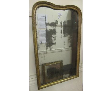 18th Century carved and gilded ghesso wall mirror, the narrow shaped beaded frame enclosing the original plate, 31ins x 19ins