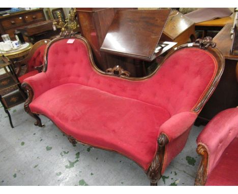 Victorian carved rosewood double chair back sofa with red button upholstery on carved cabriole supports 