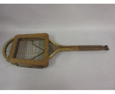 Vintage tennis racket with fish tail handle, together with three other vintage tennis rackets 
