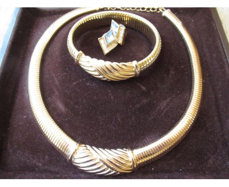 Christian Dior gold plated necklet and bangle, together with a pair of gold plated ear studs 