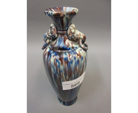 Small Linthorpe pottery baluster form vase with grotesque mask head handles and mottled blue glaze, 7ins high (chips to rim) 