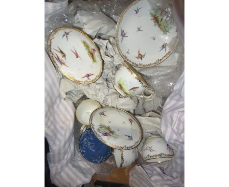 19th Century English porcelain tea service hand painted with exotic birds within gilt borders11 saucers1 bowl12 cupsSurface s