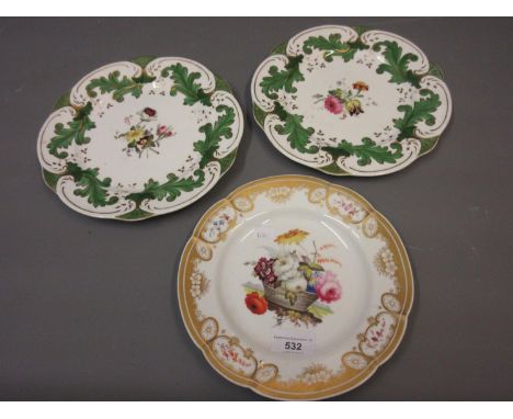 Pair of Rockingham type cabinet plates painted with floral sprigs within green and gilt borders, 9ins diameter, together with
