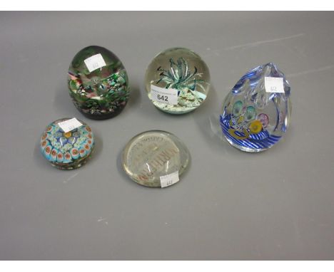 Caithness glass ' Magic Carpet ' paperweight together with five other miscellaneous paperweights 