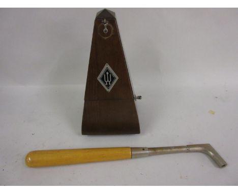 Mid 20th Century German metronome together with a piano tuning key 