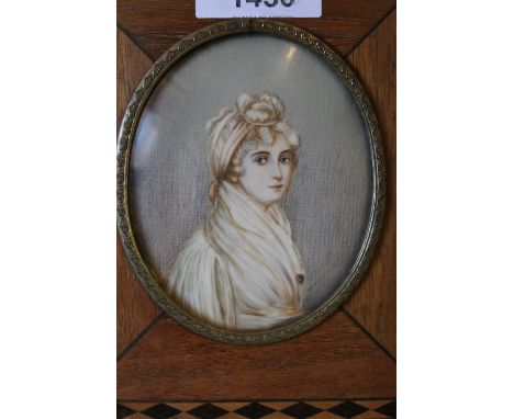 19th Century French oval miniature head and shoulder portrait of a lady, in a mahogany and inlaid frame 