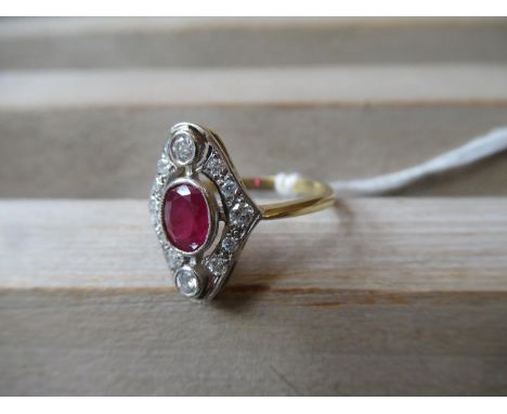 18ct Yellow gold ring having central ruby surrounded by diamonds, 0.30ct Dia / 0.85ct ruby 