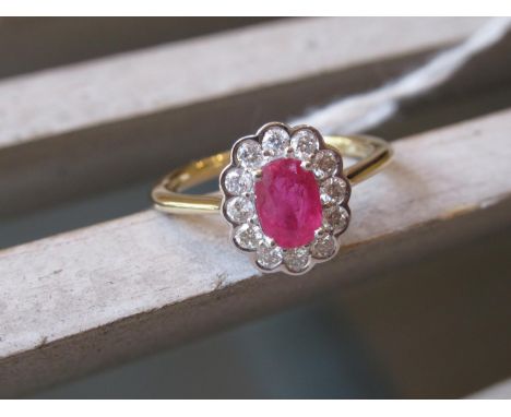 18ct Yellow gold oval ruby and diamond cluster ring 