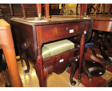 19th Century mahogany Pembroke table having single end drawer with brass knob handles, raised on ring turned tapering support