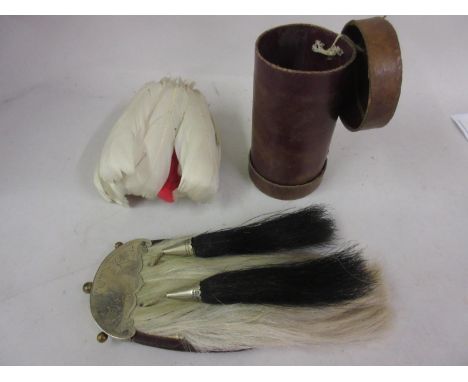 Small Scottish sporran with silver plated mounts together with a feather plume in a cylindrical leather caseSporran - approxi