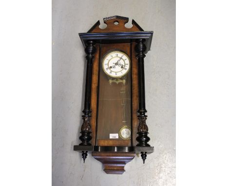 Small 19th Century Vienna type walnut and ebonised two train wall clock 