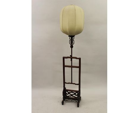 Mid 20th Century oriental hardwood lamp standardThe wooden frame is in excellent condition. The bulb / shade holder will need