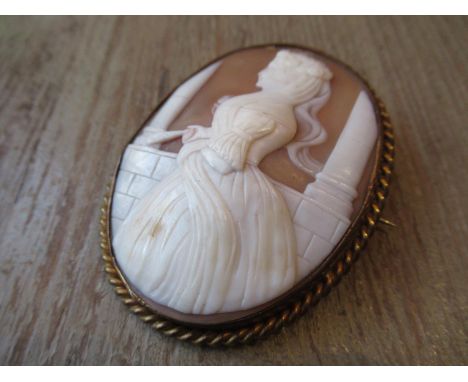 Large cameo brooch carved with a portrait of a lady in profile 